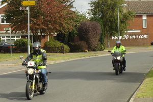 Motorcycle lessons refresher course with a big motorcycle on the road