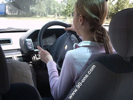 Student taking the wheel on private ground with one of our teaching staff