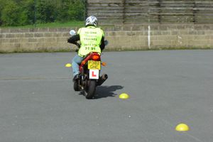 Slow control slalom on big motorcycle