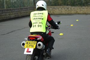 Refresher course slow control on a larger machine using a Ducati Monster 696 for motorcycle training